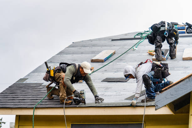 Professional Gutter Installation technician working in Watertown, MA